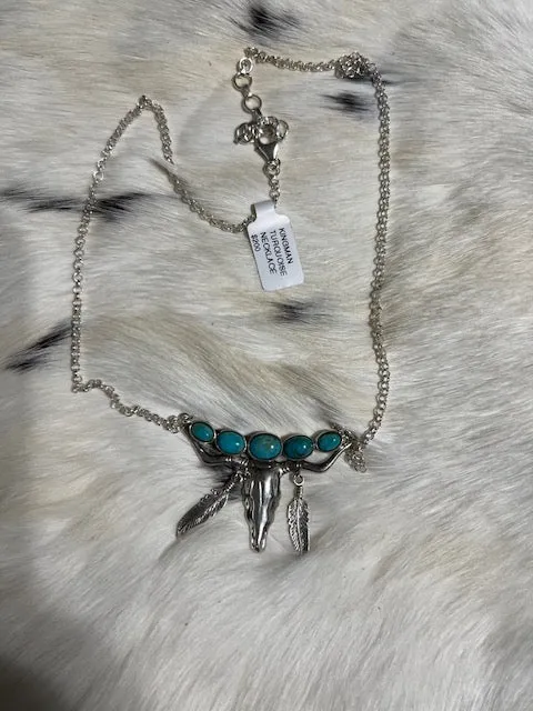 Kingman Genuine Turquoise Longhorn Bullhead with dangle feathers Sterling Silver Necklace