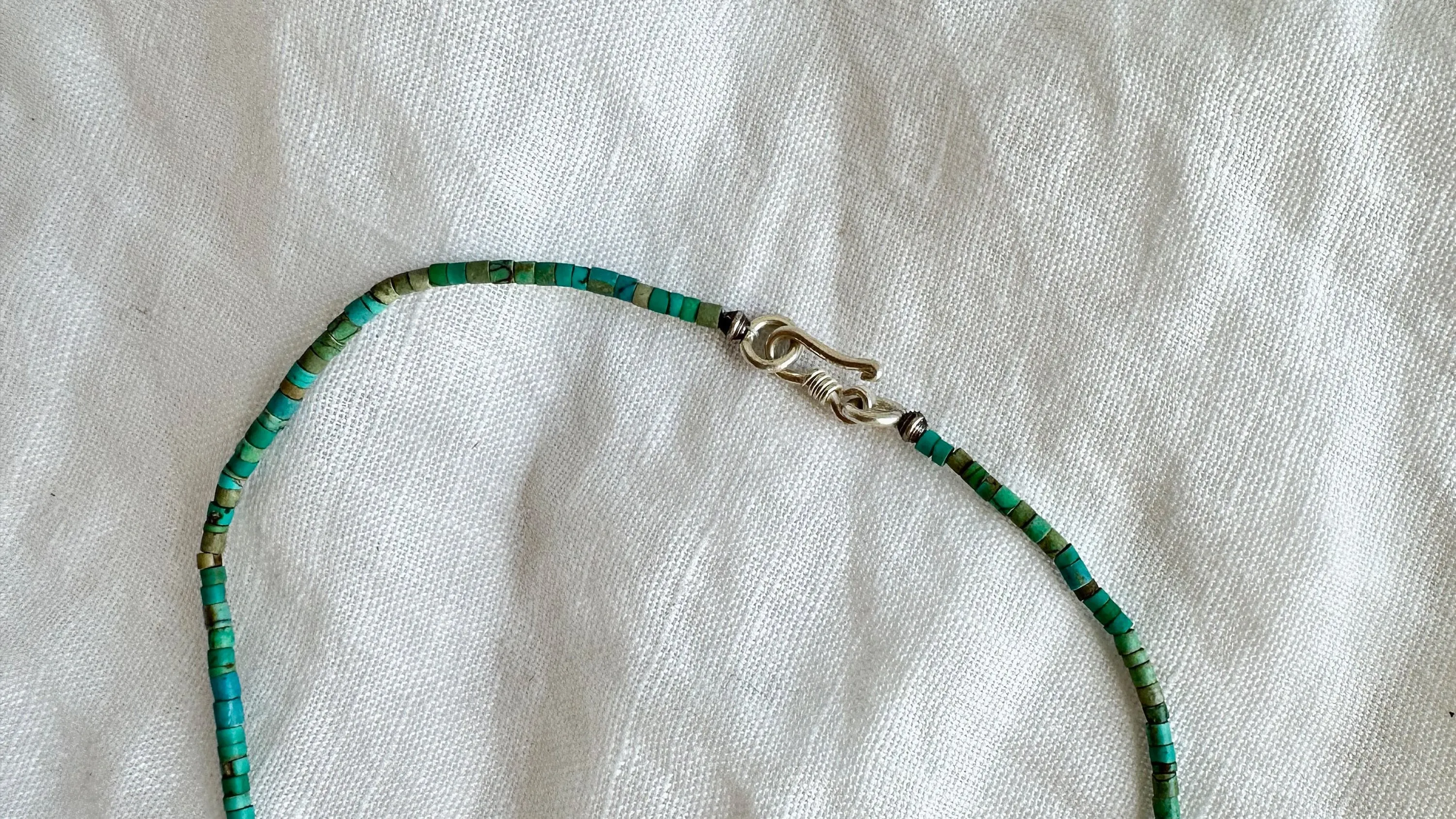 Turquoise Bird Necklace. Tiny Turquoise Heishi and Sterling Silver. 2369